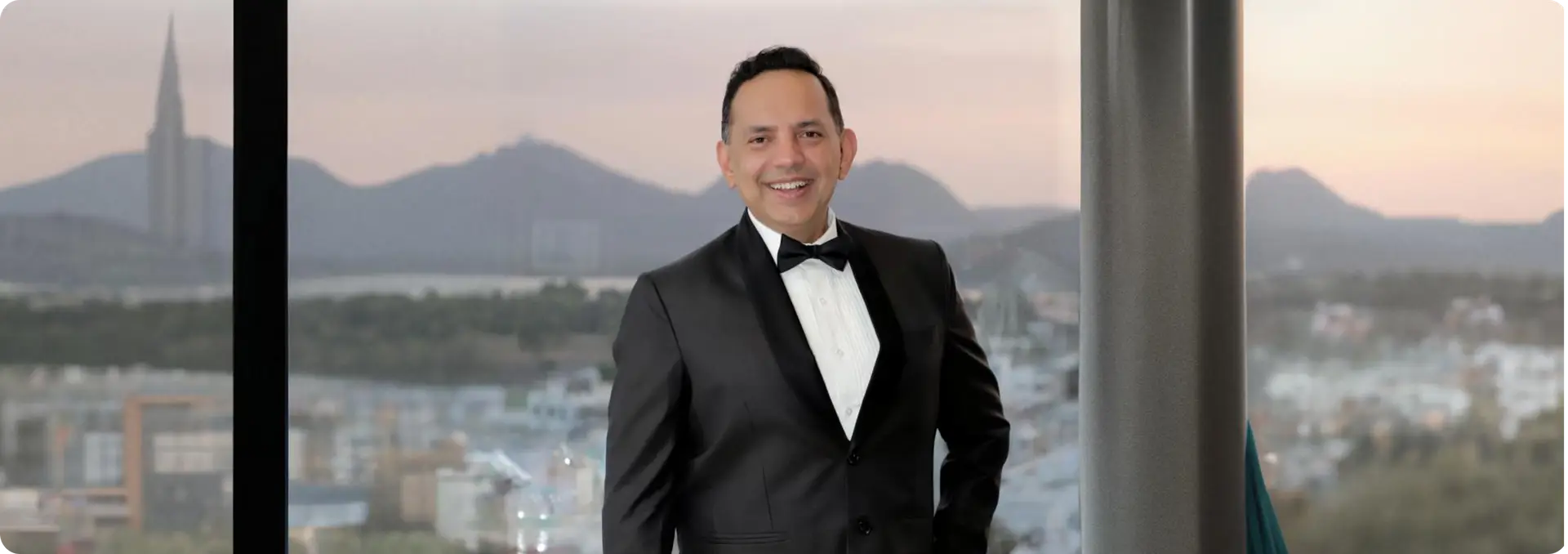 Portrait of Anand Chaturvedi in a formal blazer with a soft background